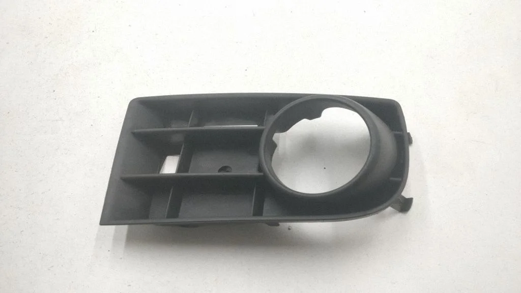 Front fog light trim/grill 1K0853666