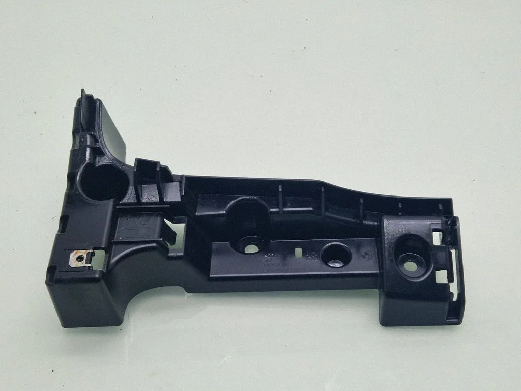 Rear bumper mounting bracket 51127158442