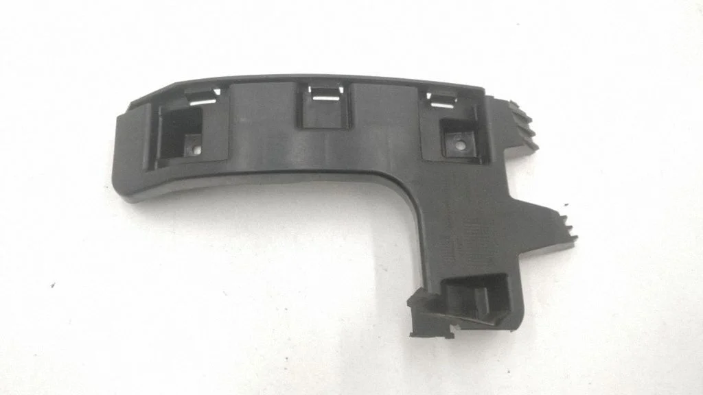 Rear bumper mounting bracket 30795054