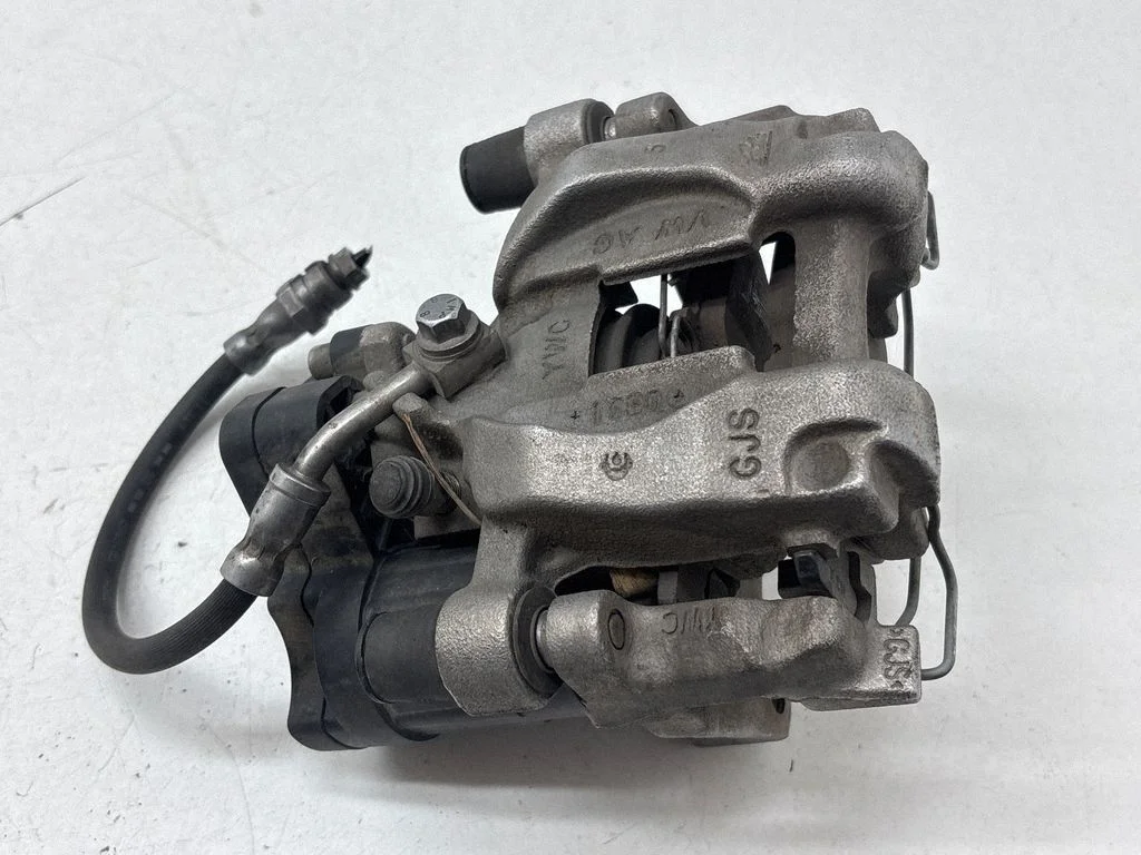Rear brake caliper 5QN615406