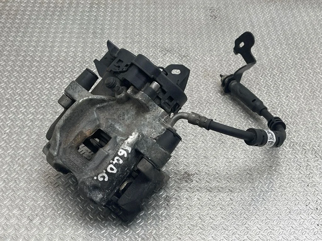 Rear brake caliper 31337516