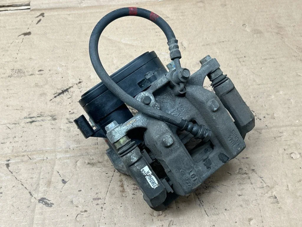 Rear brake caliper T158237700