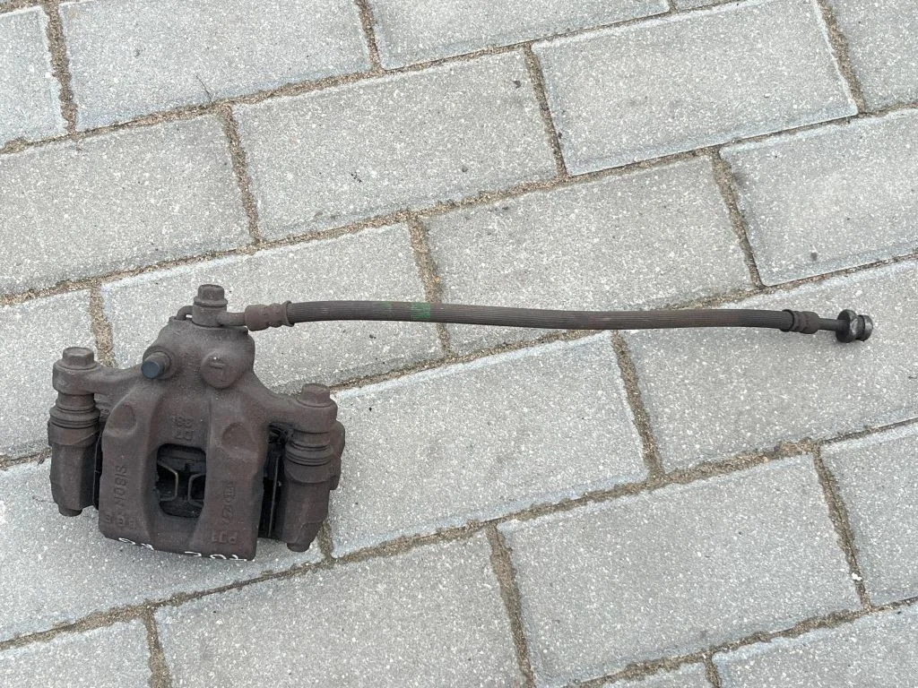 Rear brake caliper – rear left