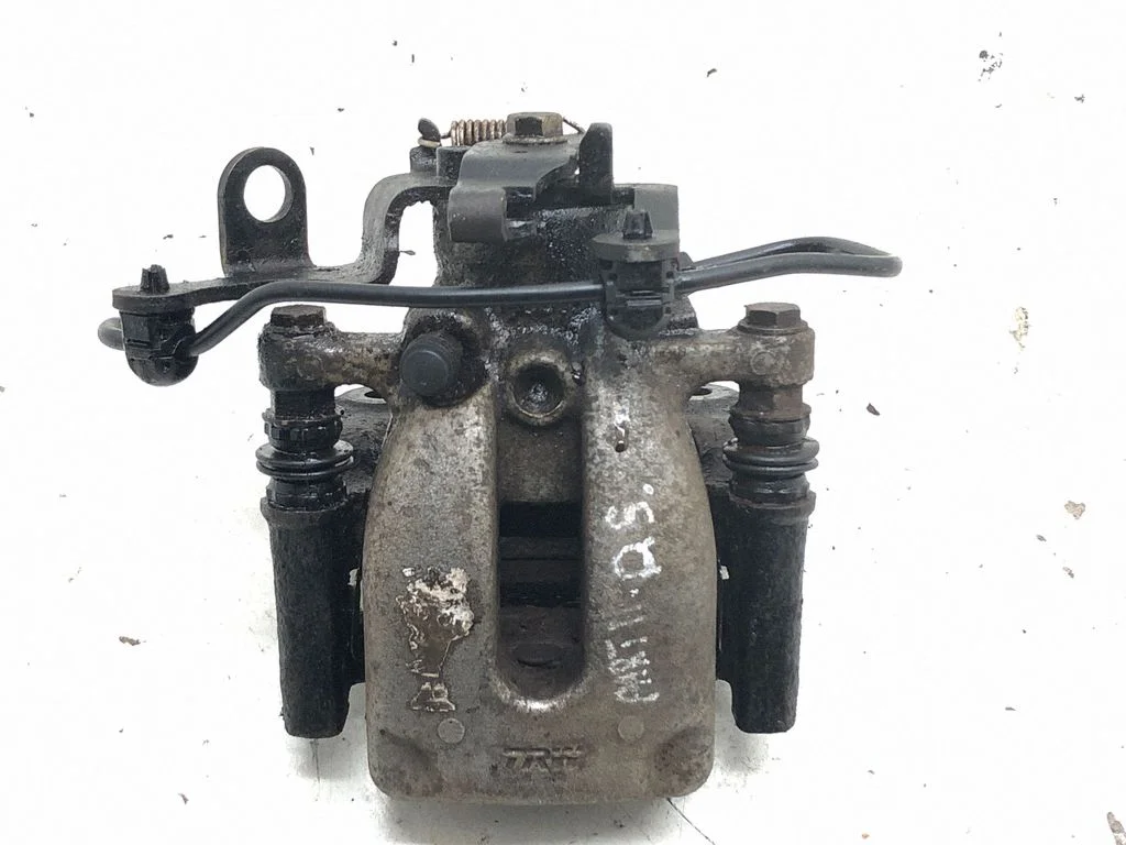 Rear brake caliper – right
