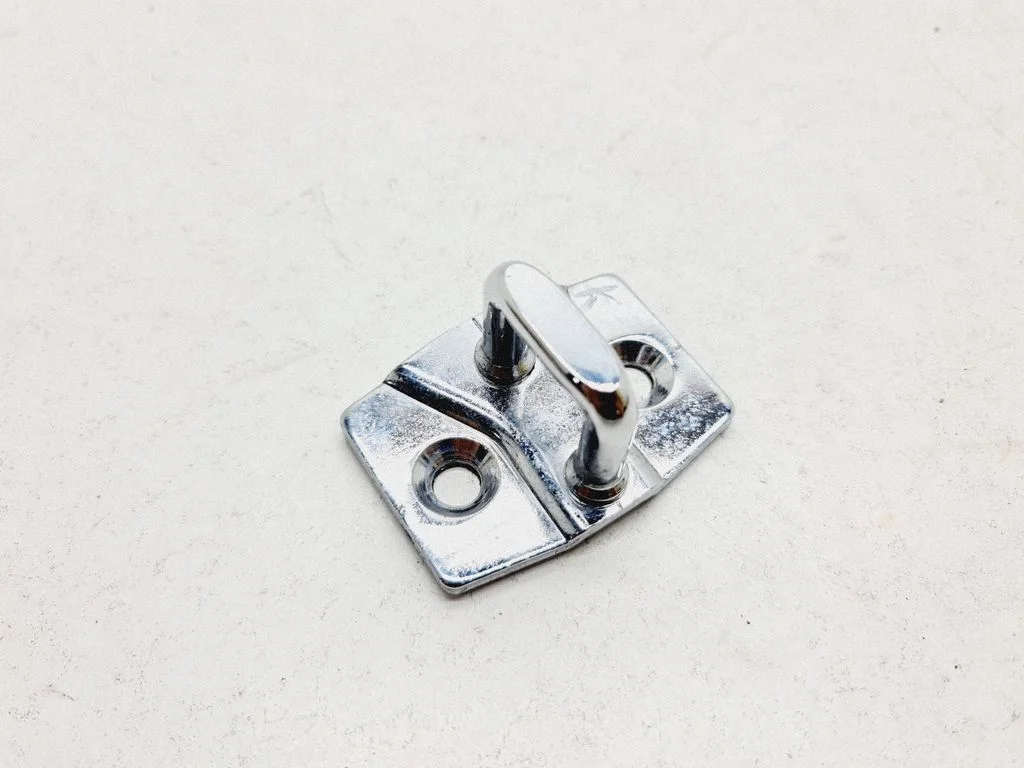 Front door lock loop/hook striker 7148705