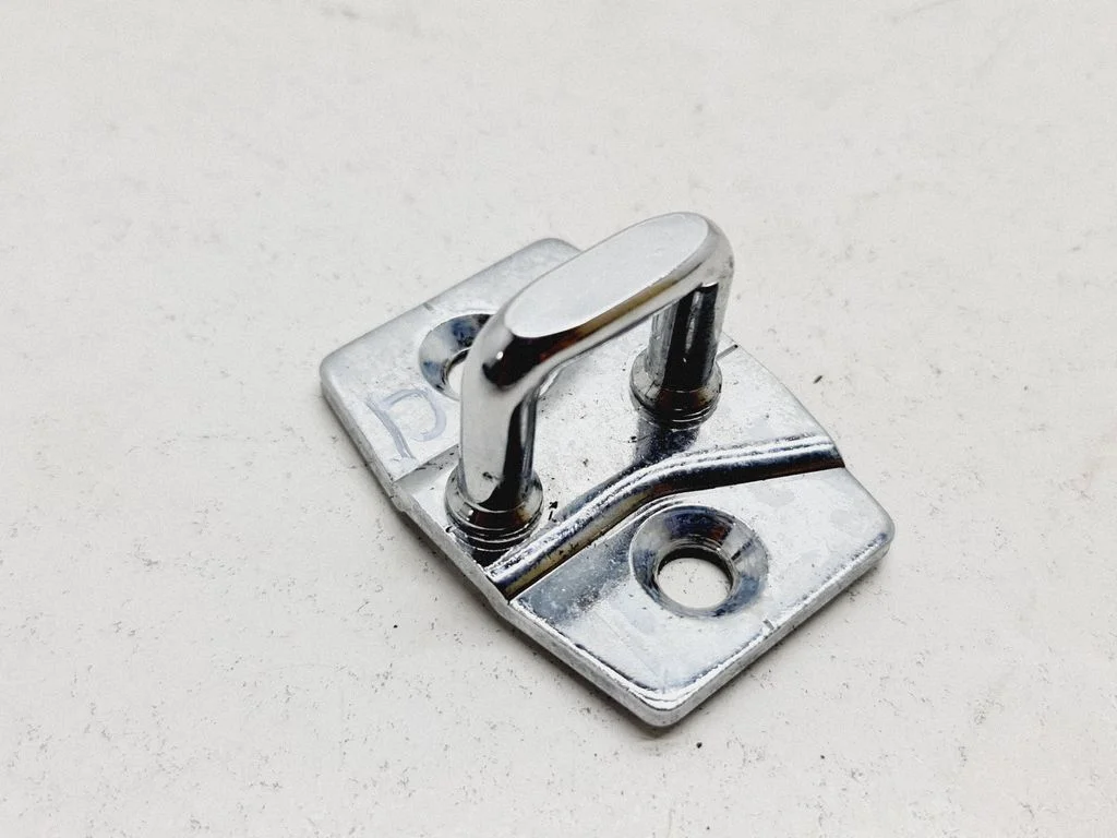 Front door lock loop/hook striker 7148705