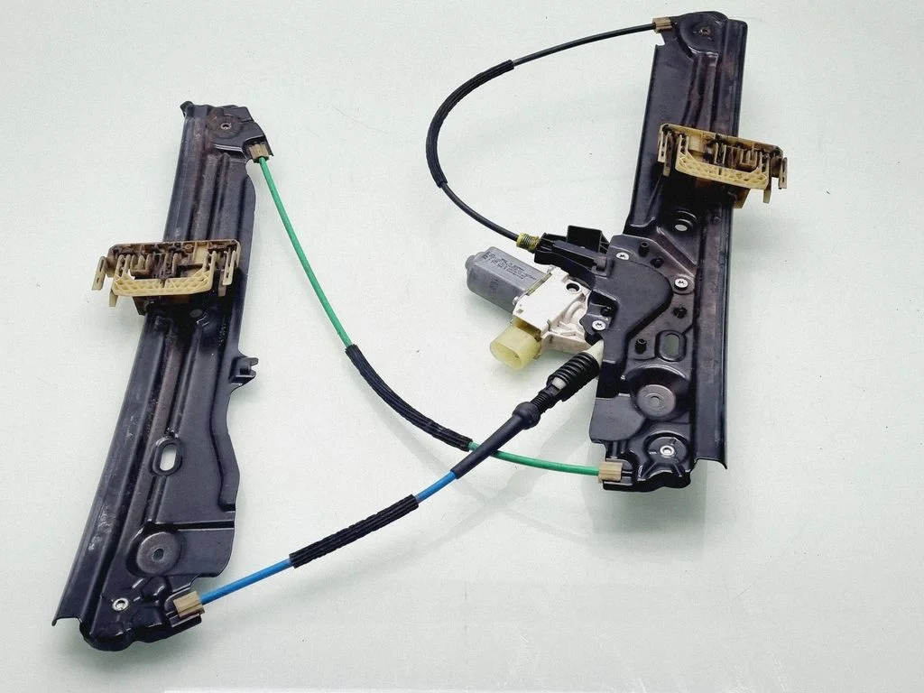 Front door window regulator with motor 7821329