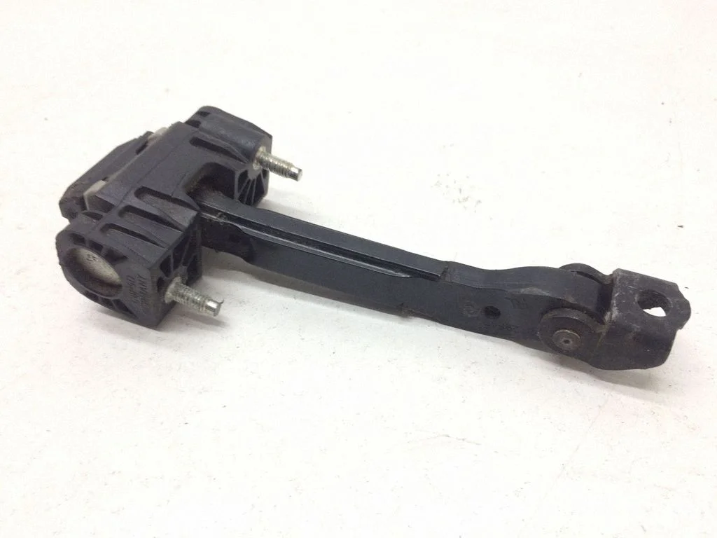 Rear door check strap stopper 31298467