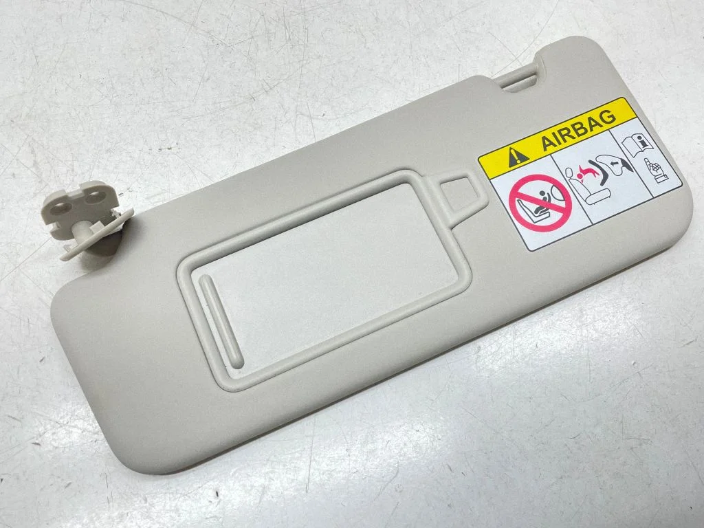 Sun visor – left