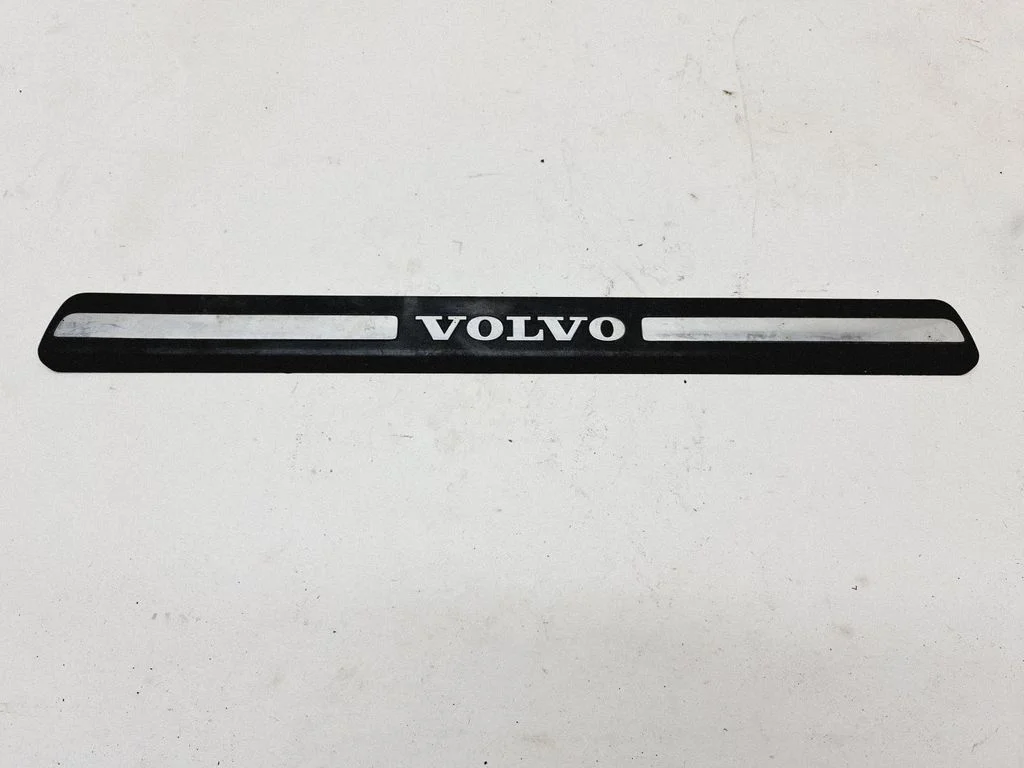 Front sill trim cover 8659960