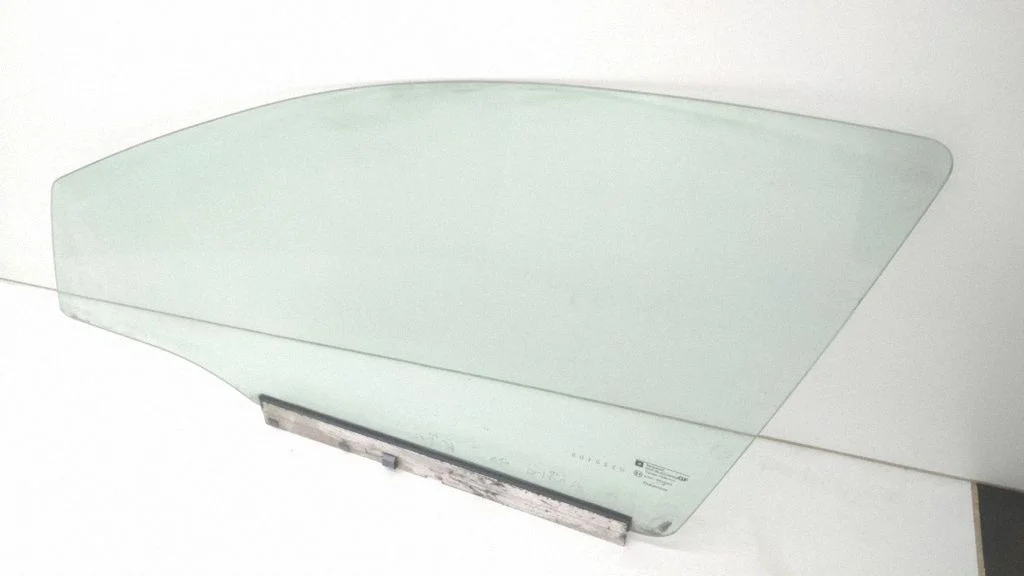 Front door window glass four-door – front left