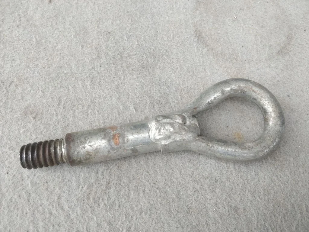 Towing hook eye
