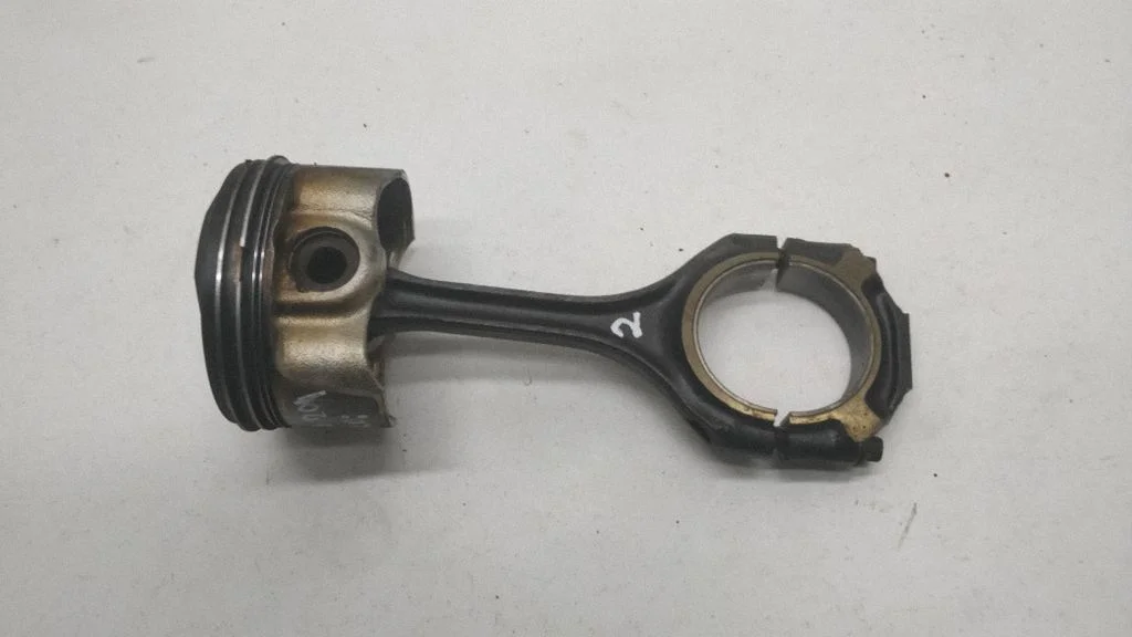 Piston with connecting rod