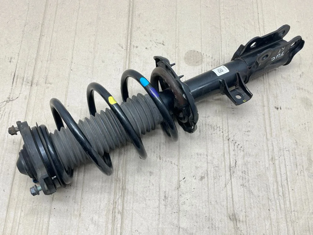 Front shock absorber with coil spring D70L54650D7000