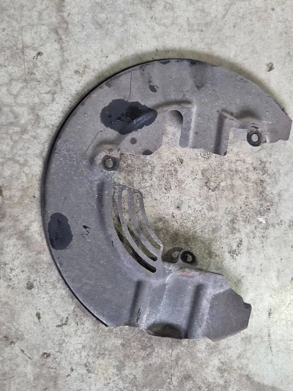 Front brake disc dust cover plate AV612C447AB