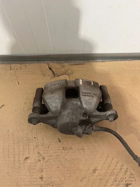 Front brake caliper 9836308080