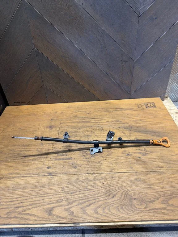 Oil level dip stick