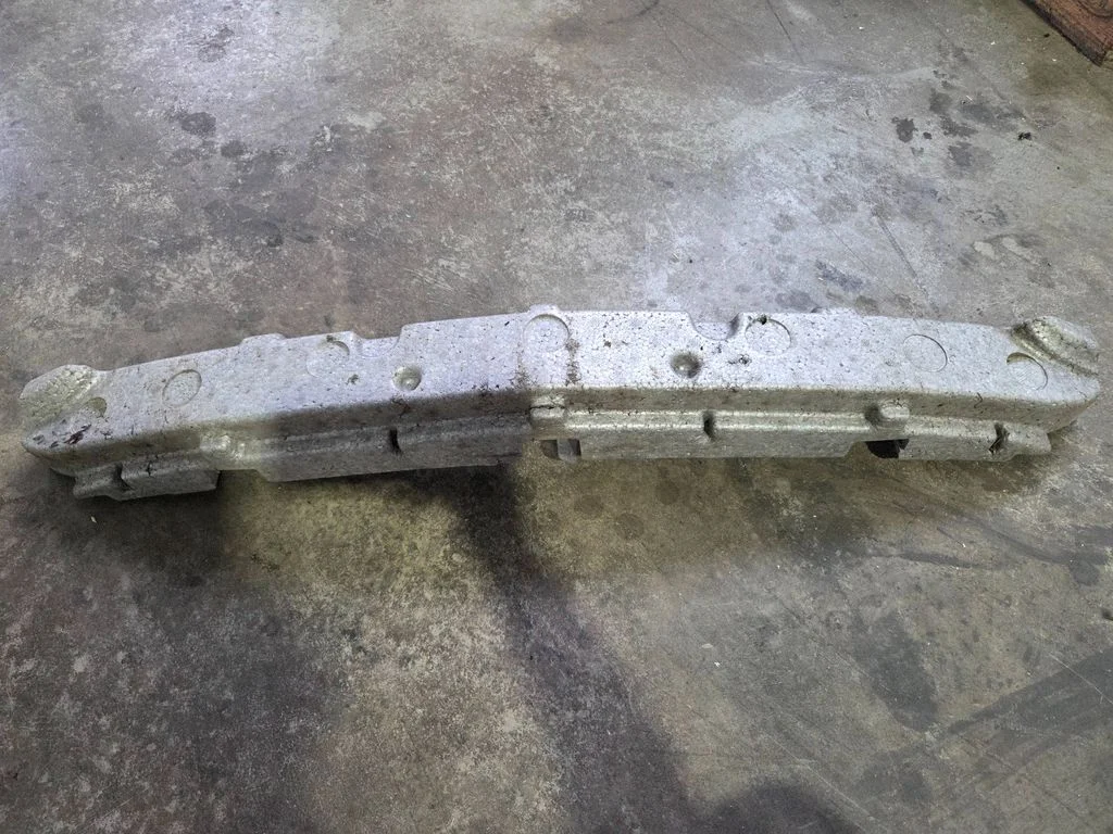 Front bumper foam support bar 25953700