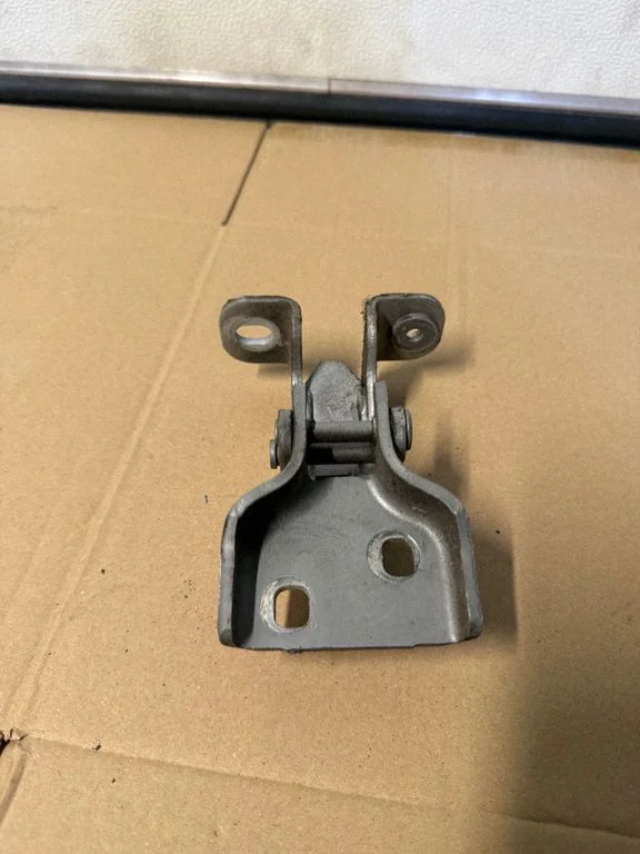 Front door lower hinge