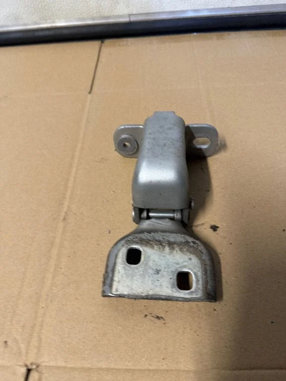 Front door lower hinge