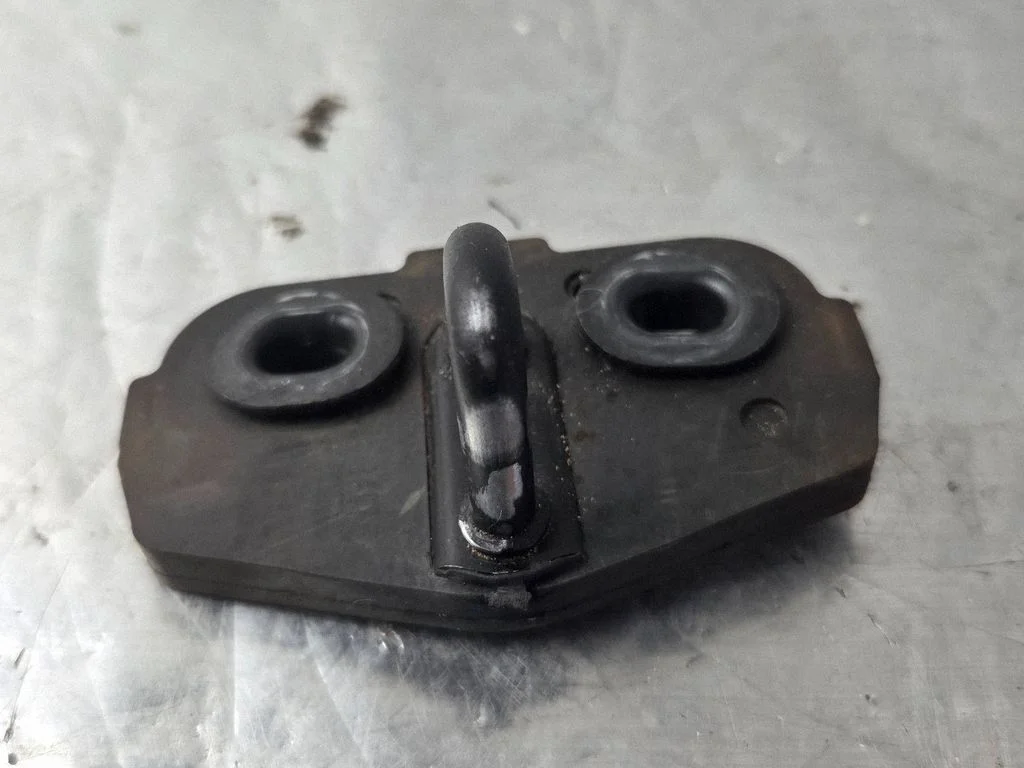 Loading door lock loop/hook striker