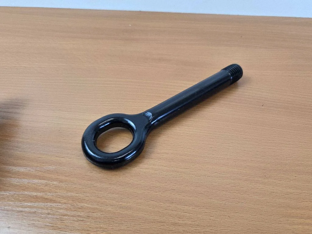 Towing hook eye