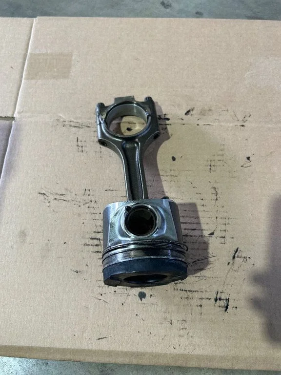 Piston with connecting rod