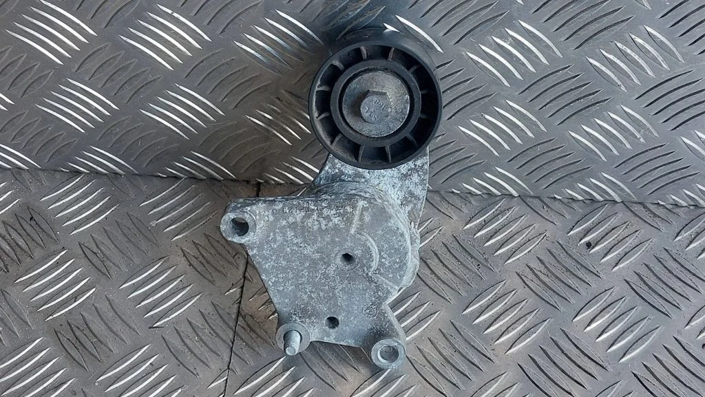 Generator/alternator belt tensioner