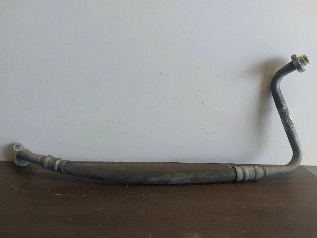 Air conditioning (A/C) pipe/hose 55K09