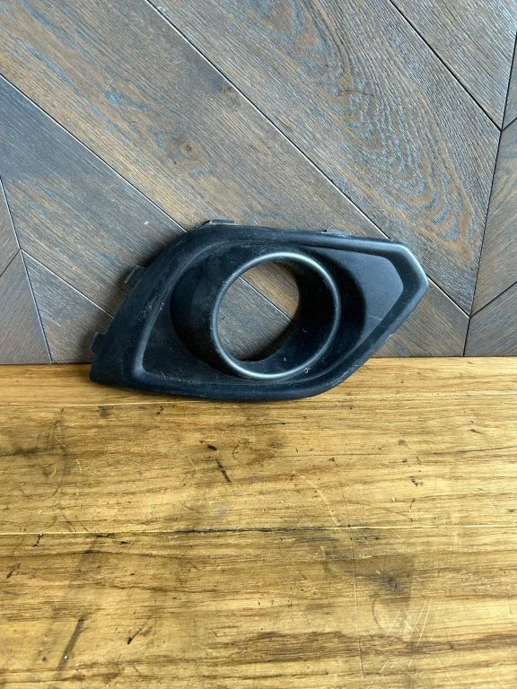 Front fog light trim/grill 25953659