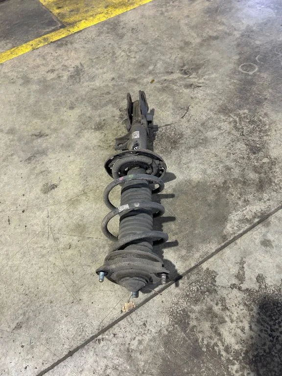 Front shock absorber with coil spring T16C08A0958