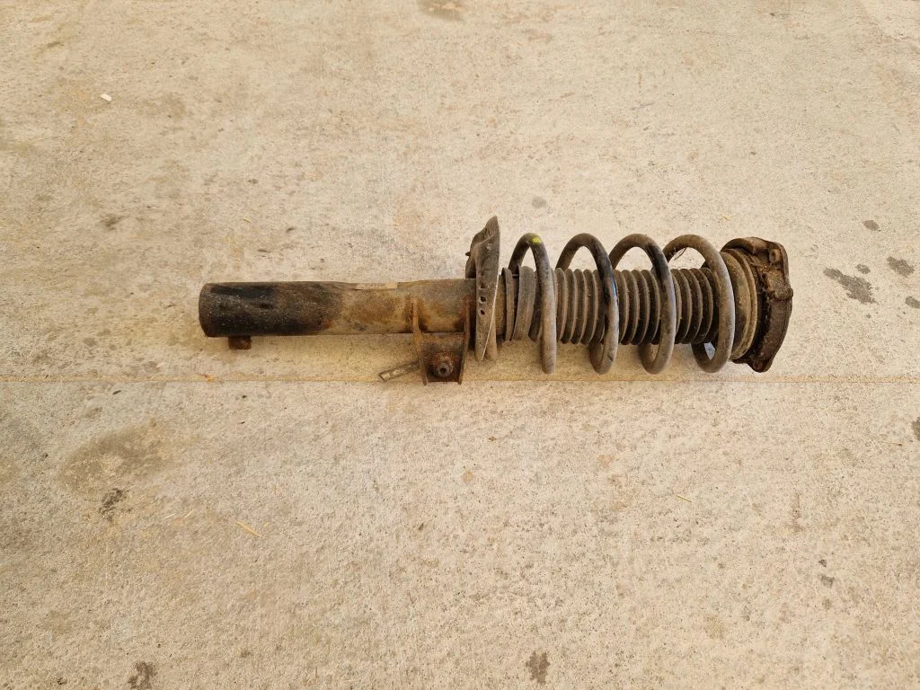 Front shock absorber with coil spring 3AA413031M
