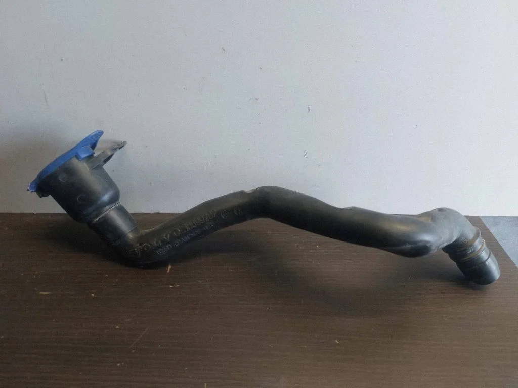 Window washer liquid tank fill tube – Volvo XC70 (2008-2013)