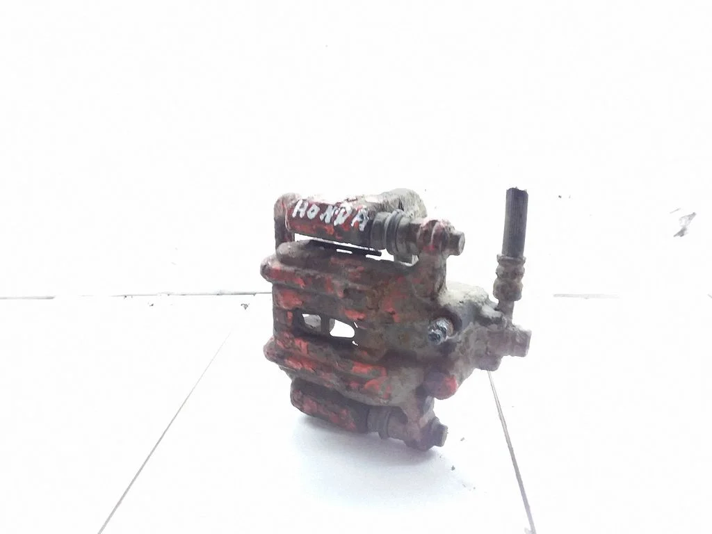 Rear brake caliper – rear left