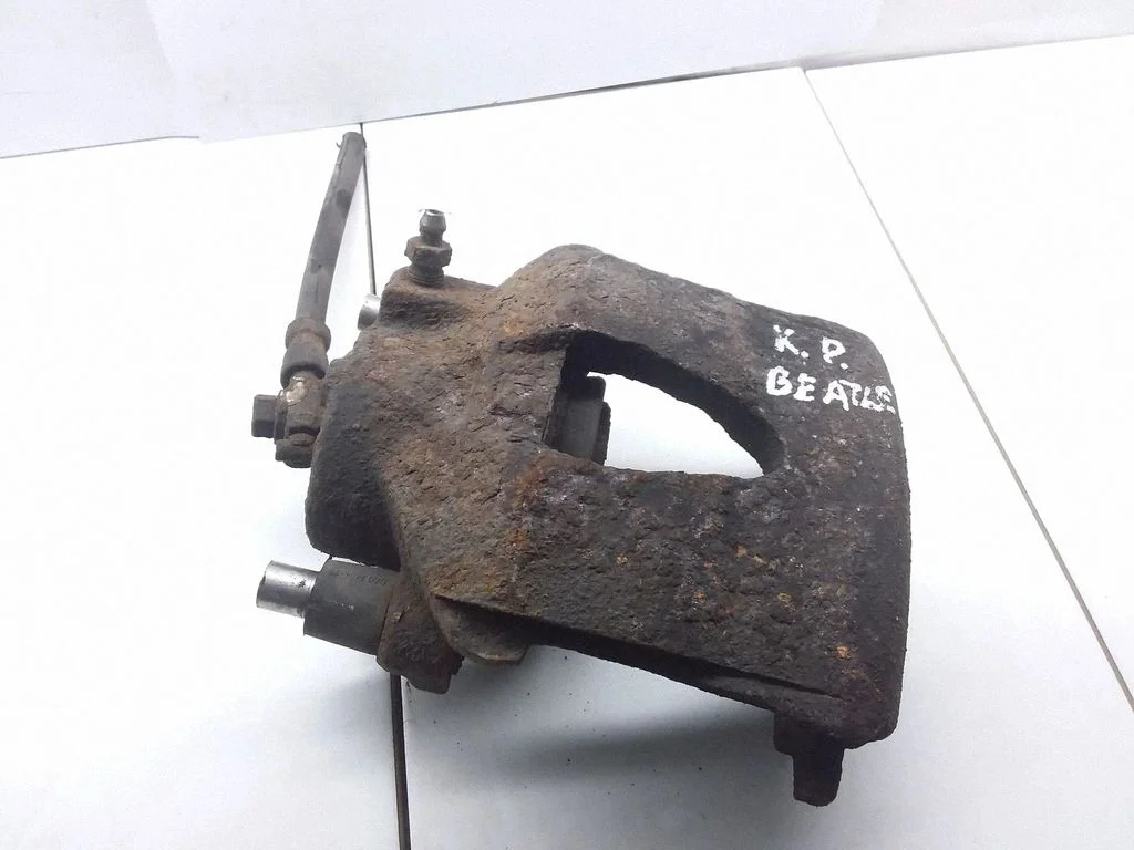 Front brake caliper – front left