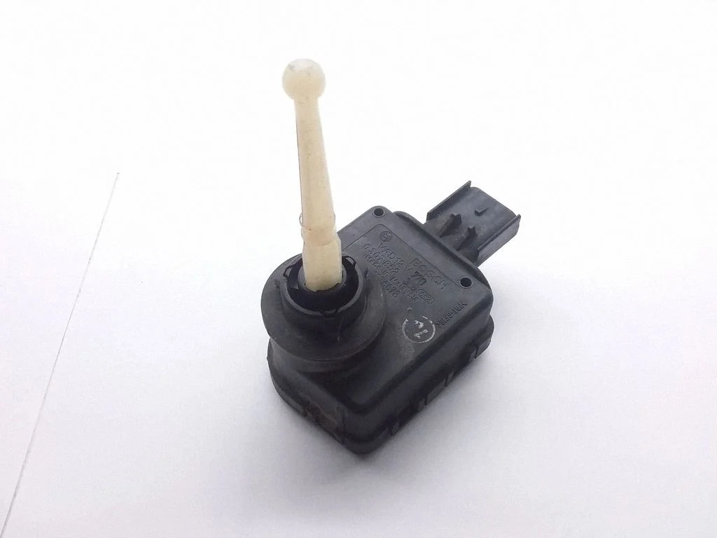 Headlight level adjustment motor – Chrysler Grand Voyager III (1995-2000)