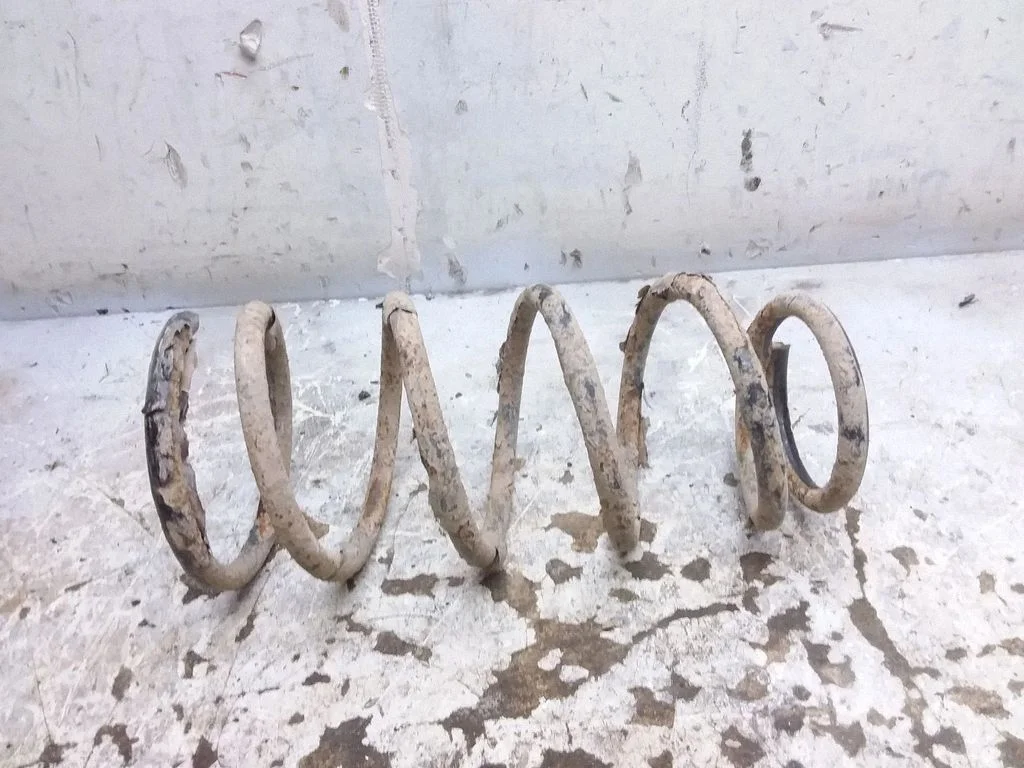 Aizmugurējā spirālatspere