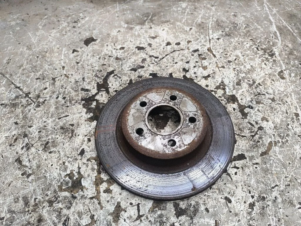 Rear brake disc – left