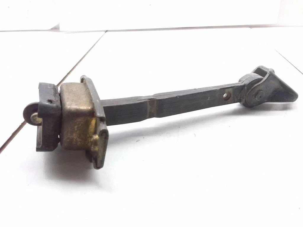Rear door check strap stopper – right