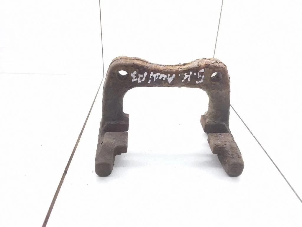 Brake caliper pad carrier rear