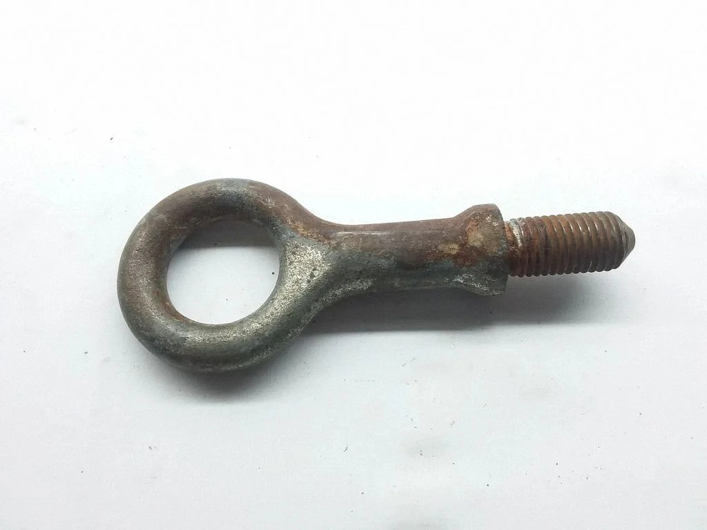 Towing hook eye