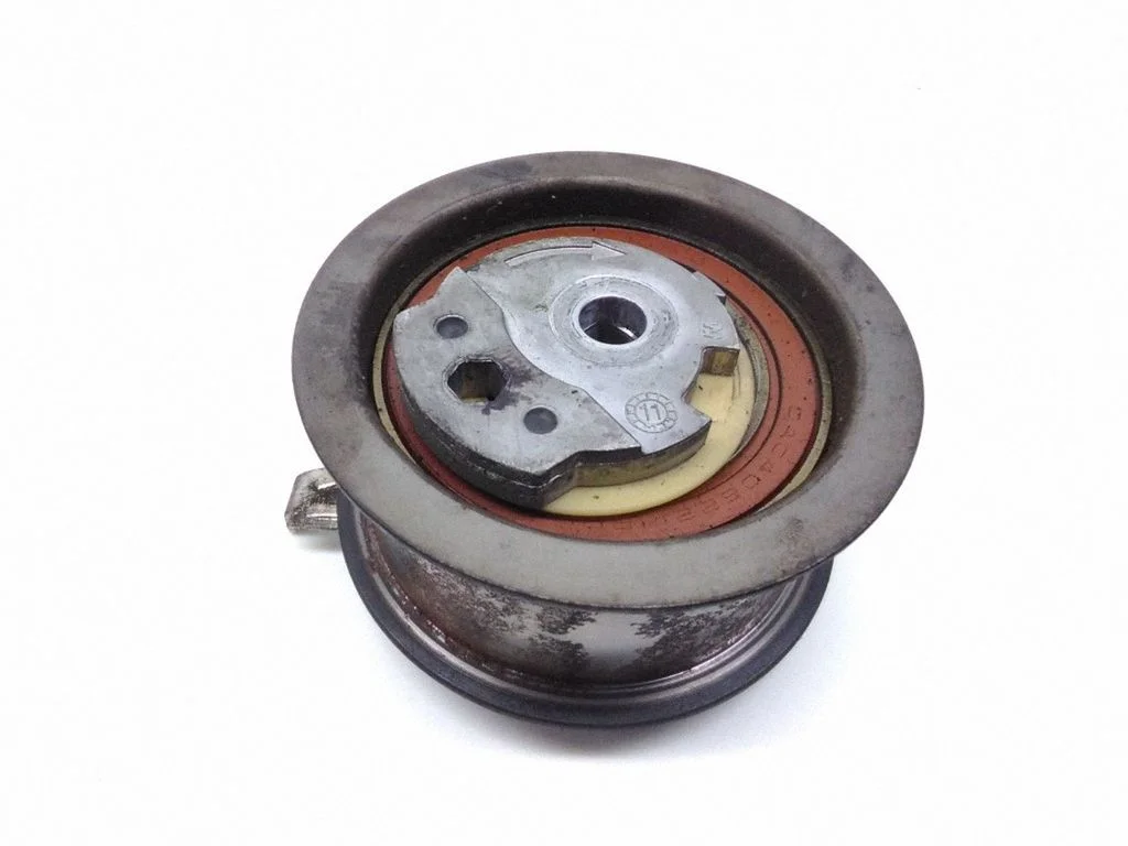 Timing belt/chain tensioner 038109243M