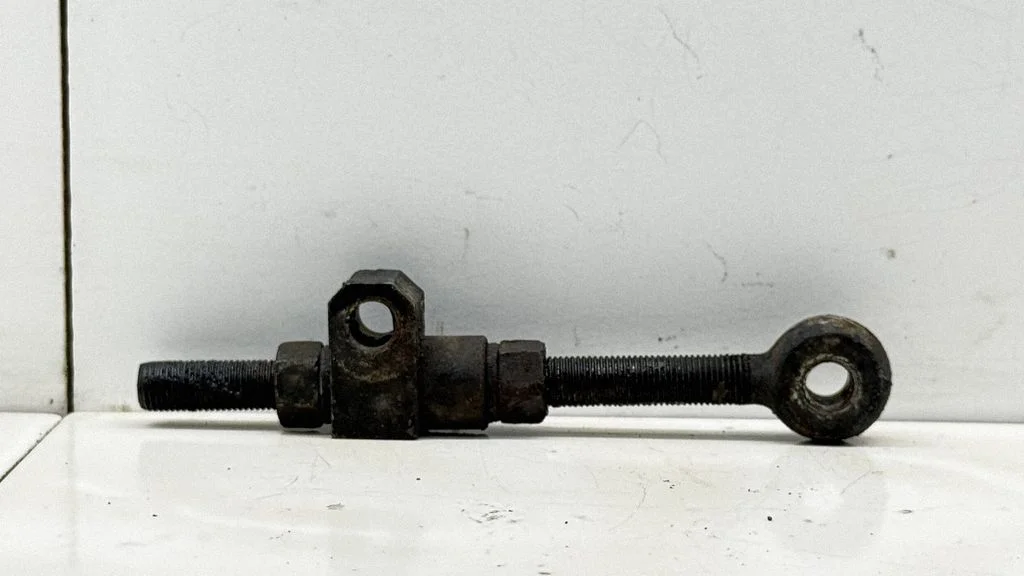 Alternator belt tensioner