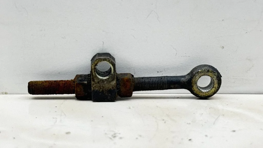Alternator belt tensioner