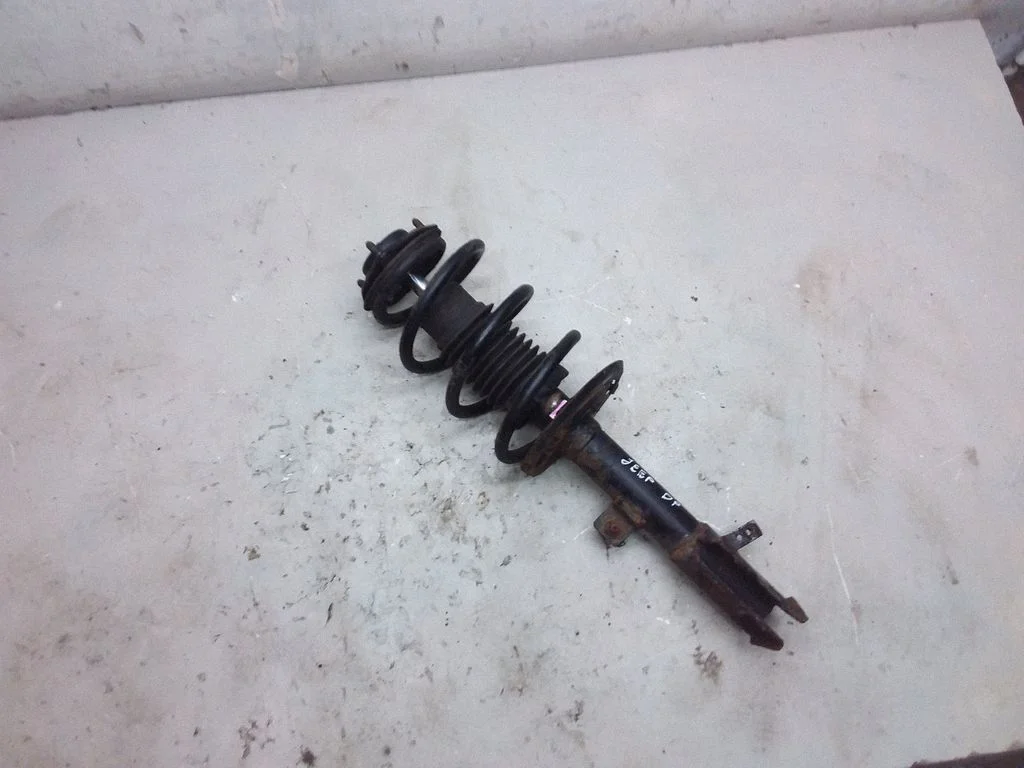 Front shock absorber with coil spring 973AD