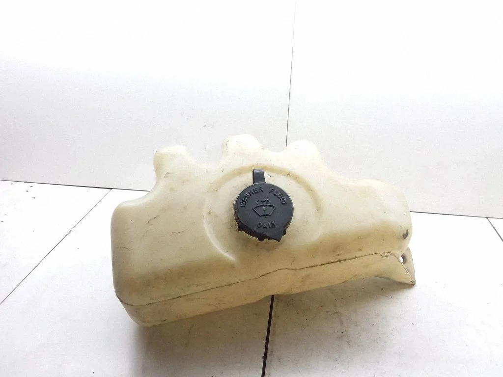 Lamp washer fluid tank