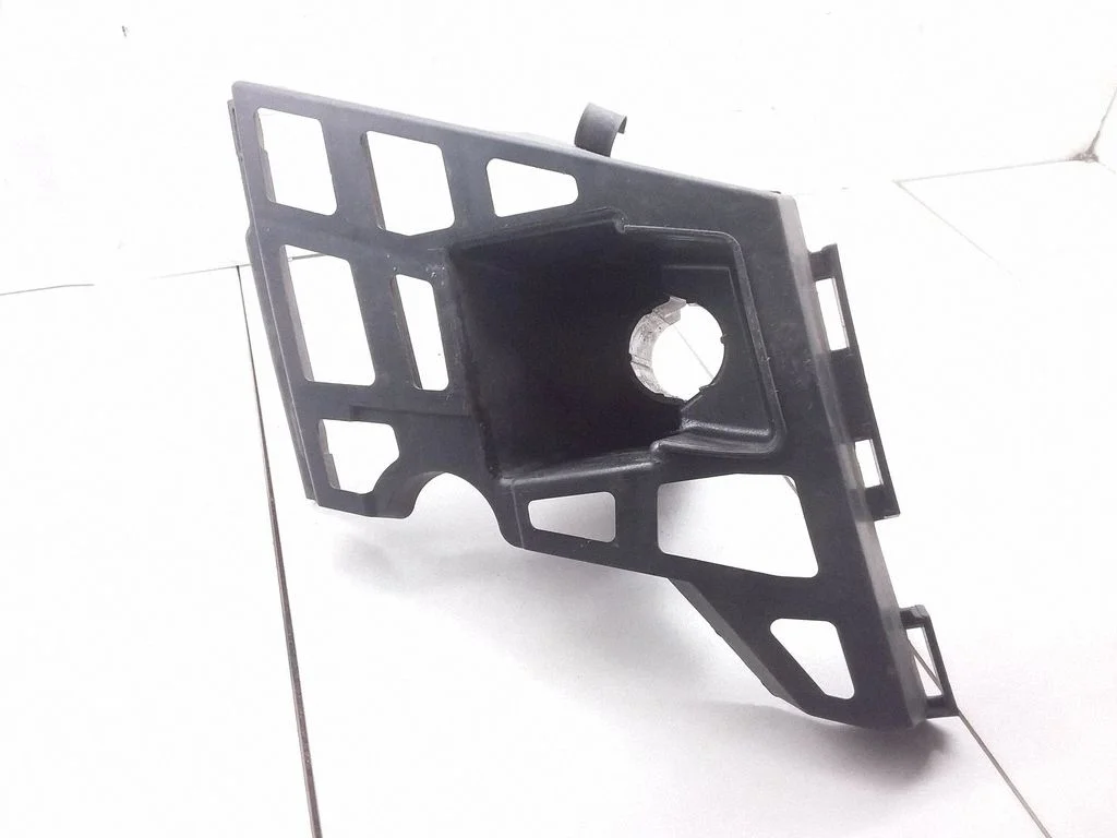 Headlight washer nozzle holder – Skoda Yeti (5L) (2009-2017)