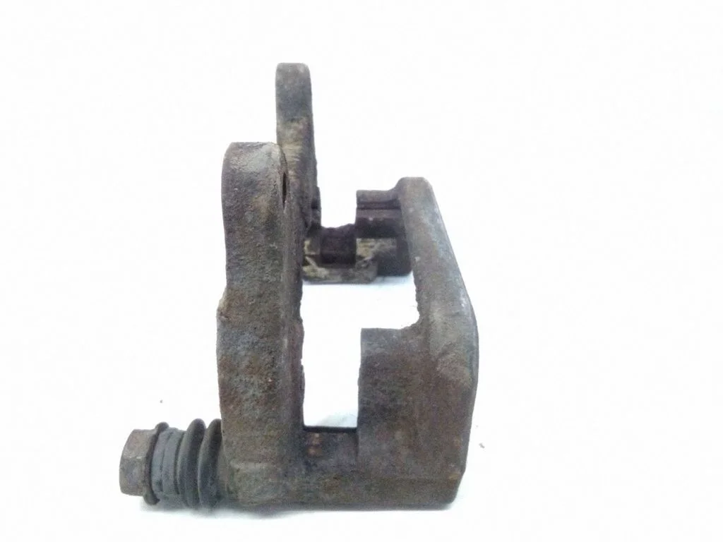 Front Brake Caliper Pad/Carrier – left