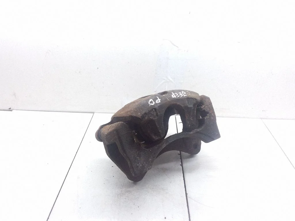 Front brake caliper – right