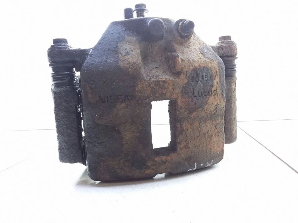 Front brake caliper – left